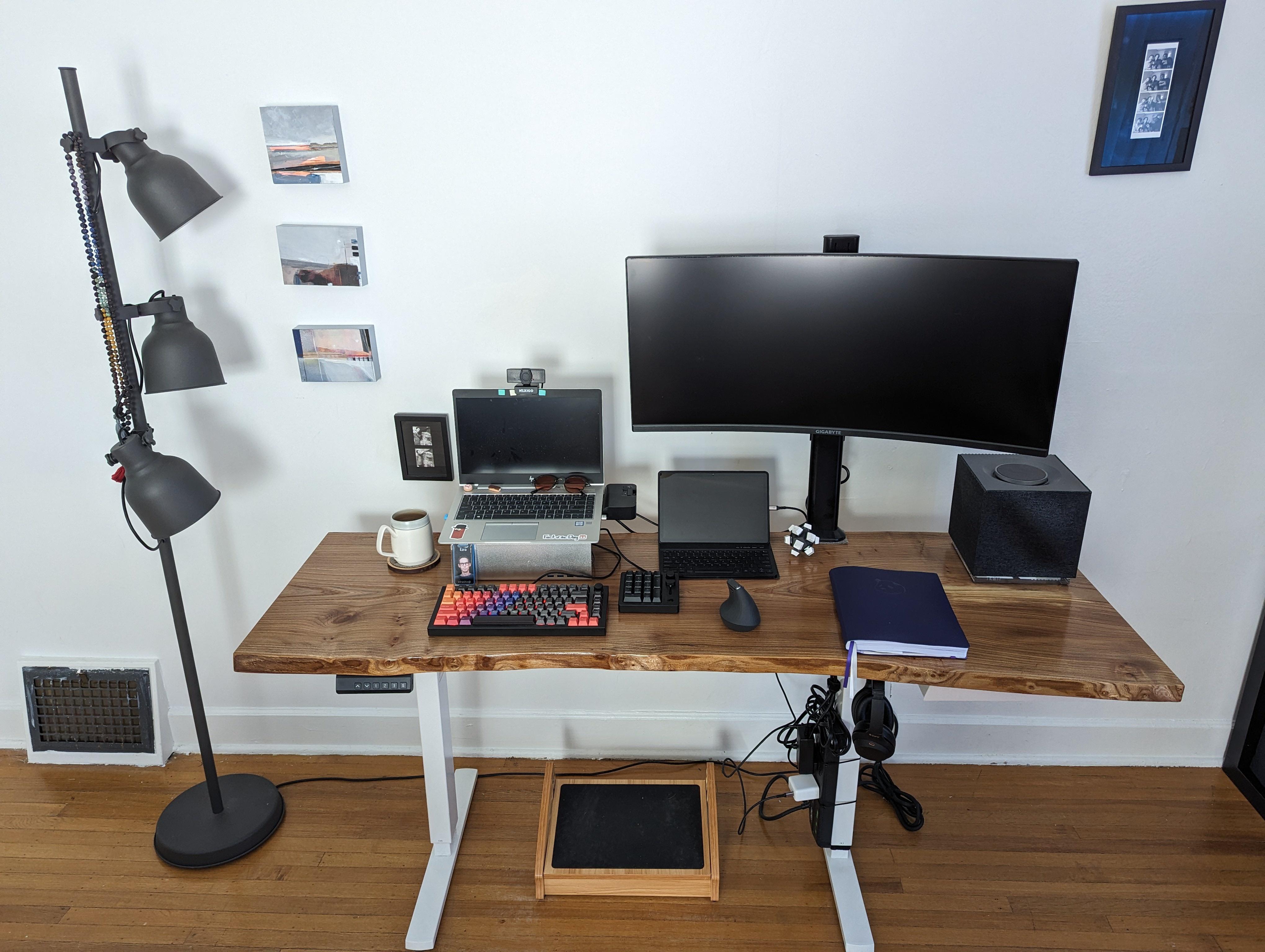 I rebuilt my standing desk by woodworking a live edge slab of English Elm into desk top.